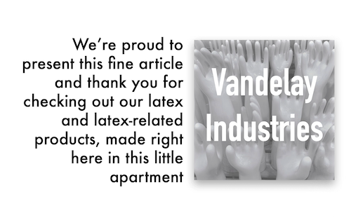 On the right, a graphic with the words « Vandelay Industries » overlayed on a washed-out, semi-transparent photograph of rubber glove moulds. On the left are the words: « We’re proud to present this fine article and thank you for checking out our latex and latex-related products, made right here in this little apartment »